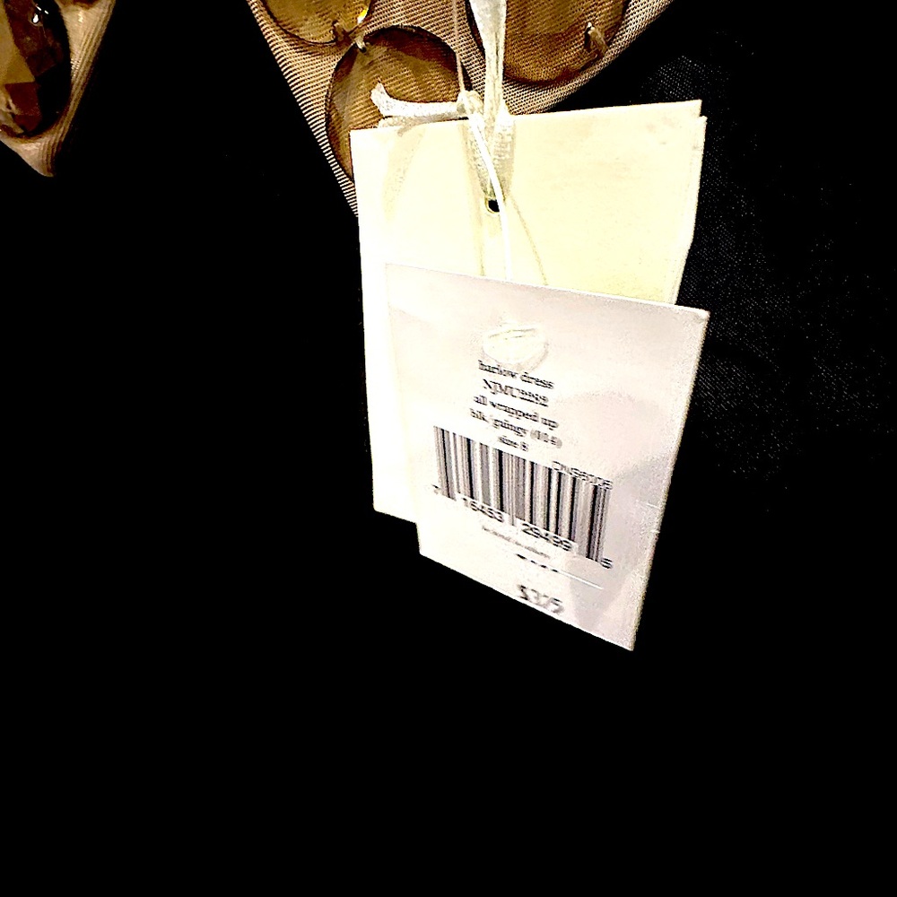 Kate Spade unique dress size 8 never worn still has the tags on it
